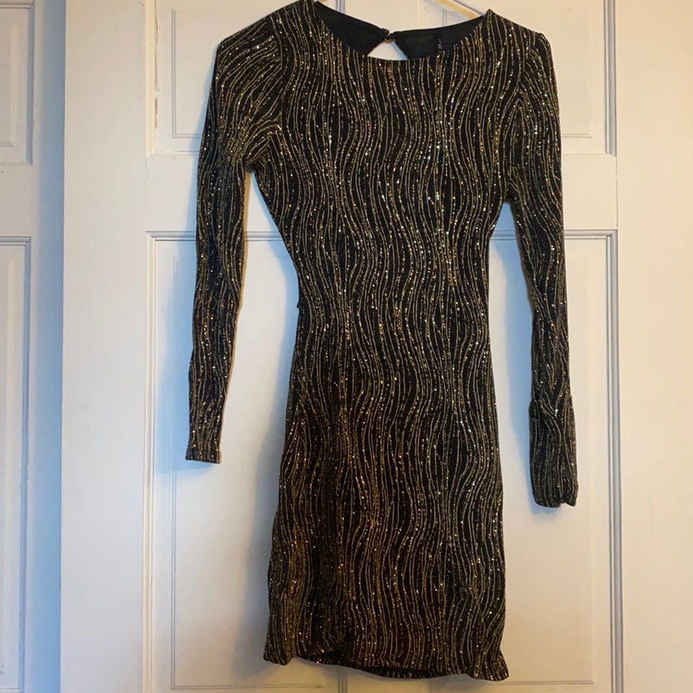 Long sleeved backless dress